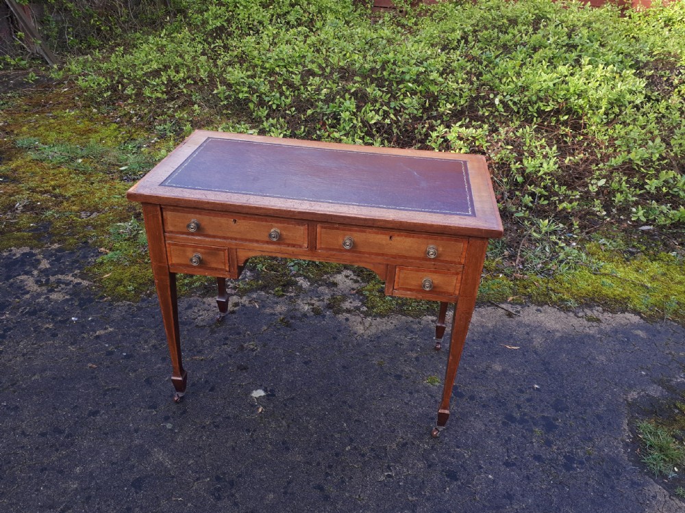 Edwardian inlaid mahogany writing table 