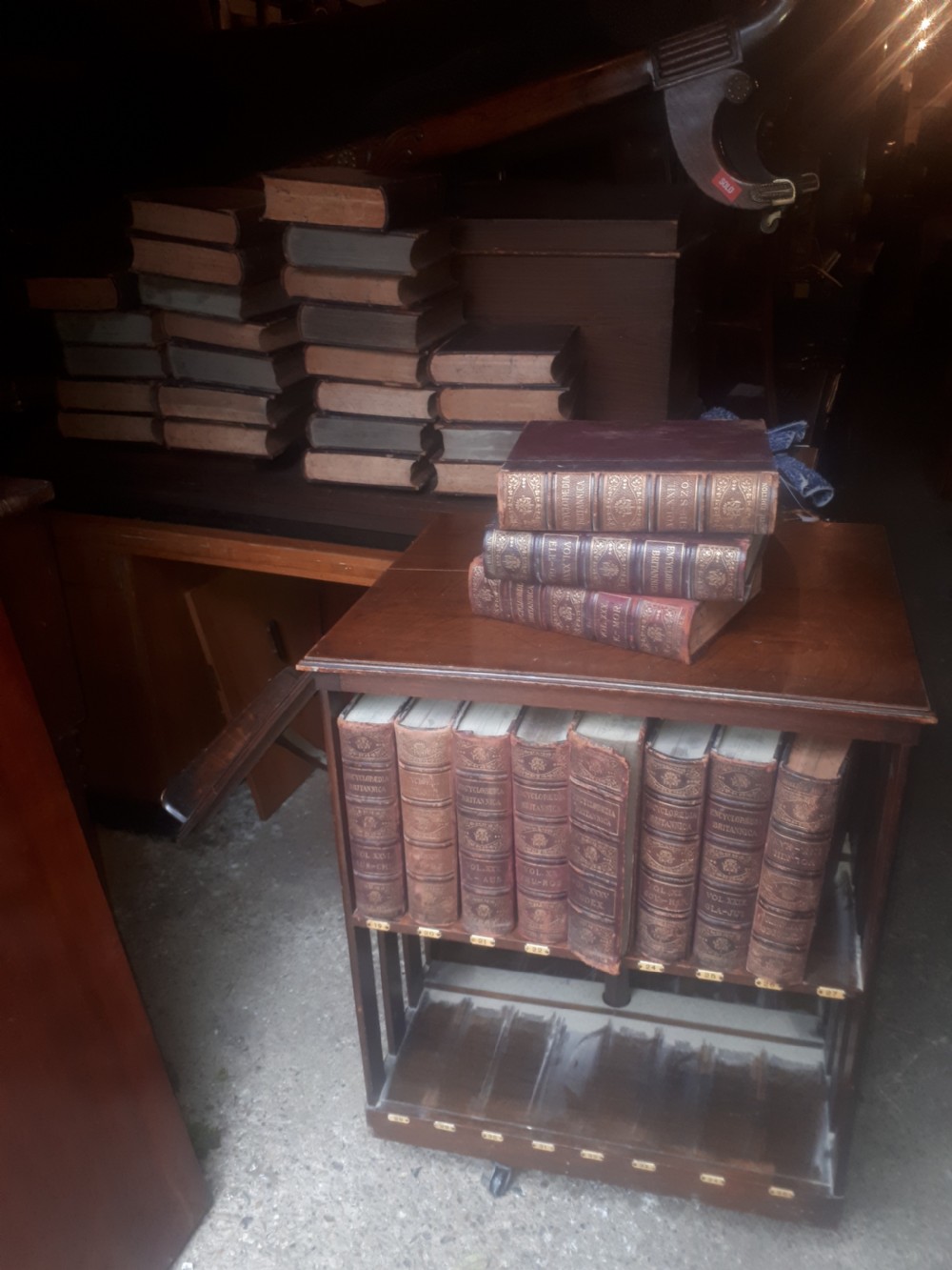 Encyclopedia Britannica revolving bookcase with a complete set of books View III