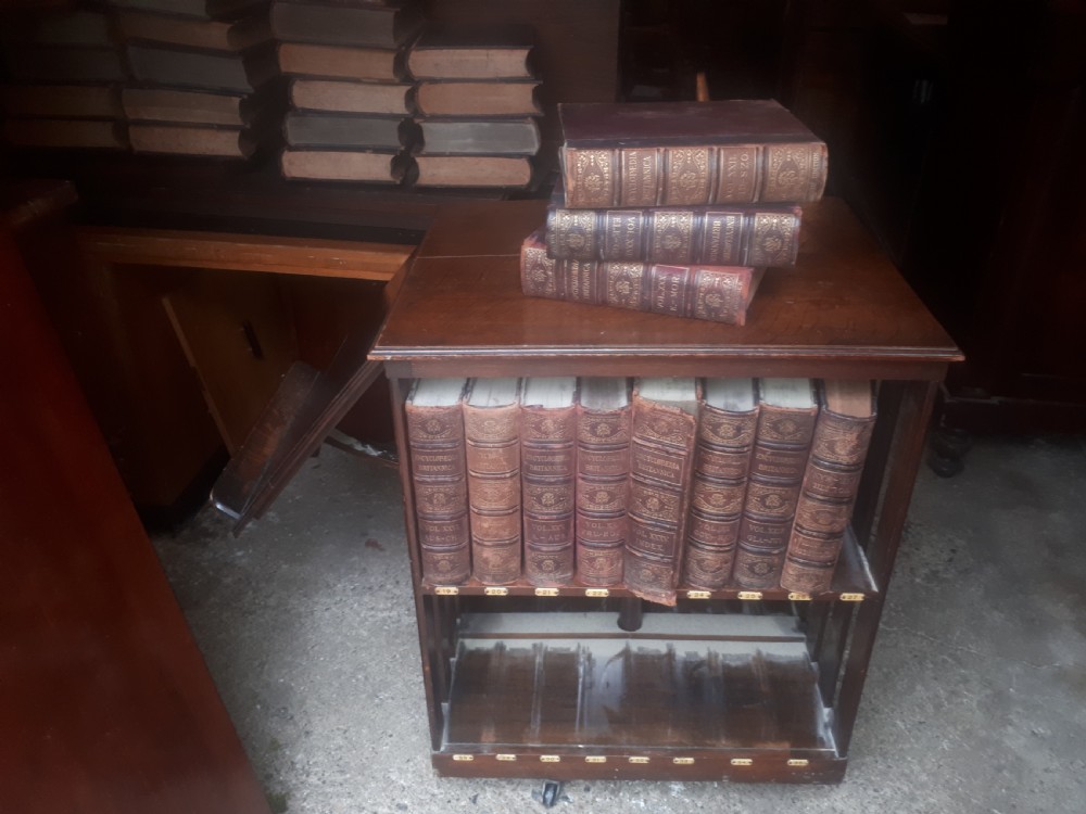 Encyclopedia Britannica revolving bookcase with a complete set of books View V