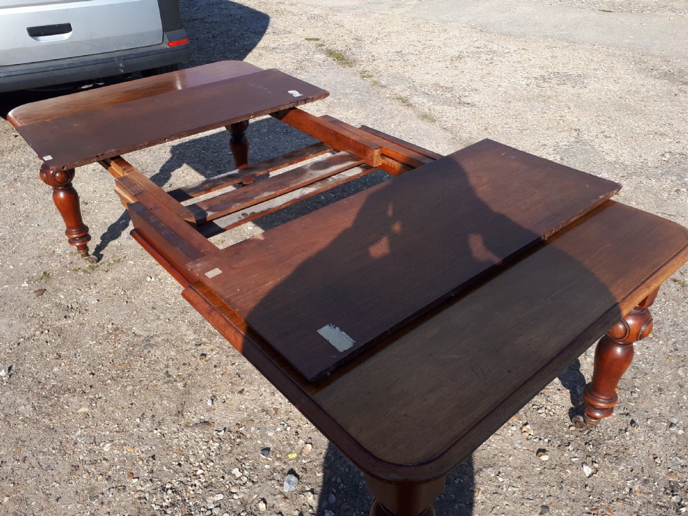 Early Victorian mahogany 2 leaf extending dining table  View III