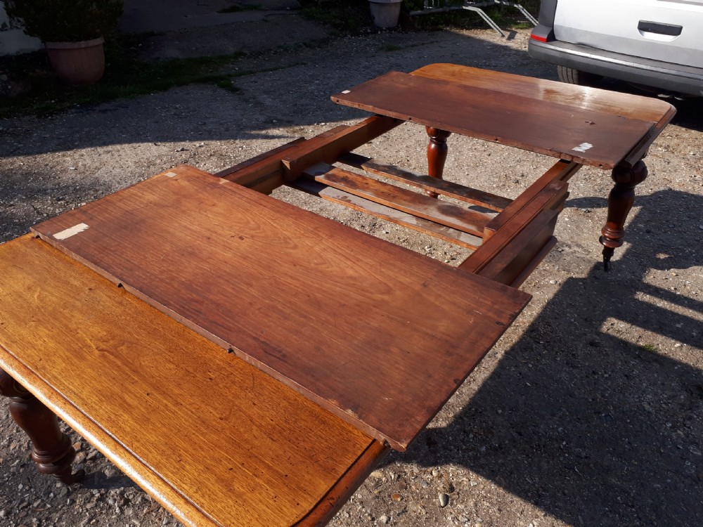 Early Victorian mahogany 2 leaf extending dining table  View IV