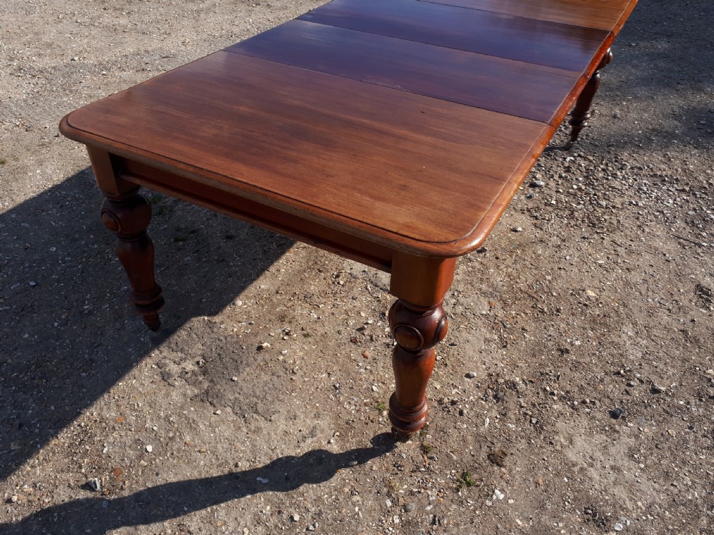 Early Victorian mahogany 2 leaf extending dining table  View V