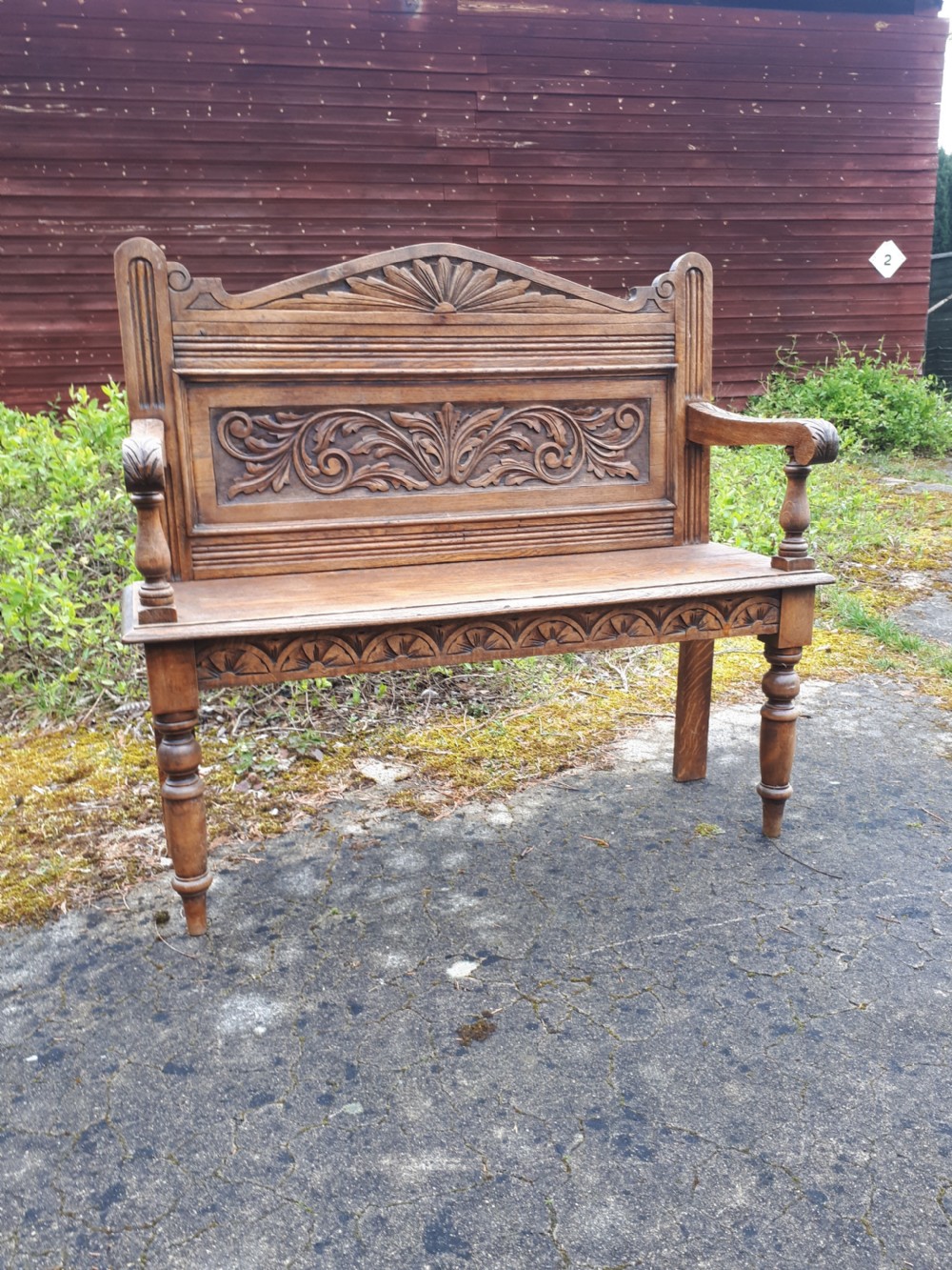 Late Victorian carved oak hall seat