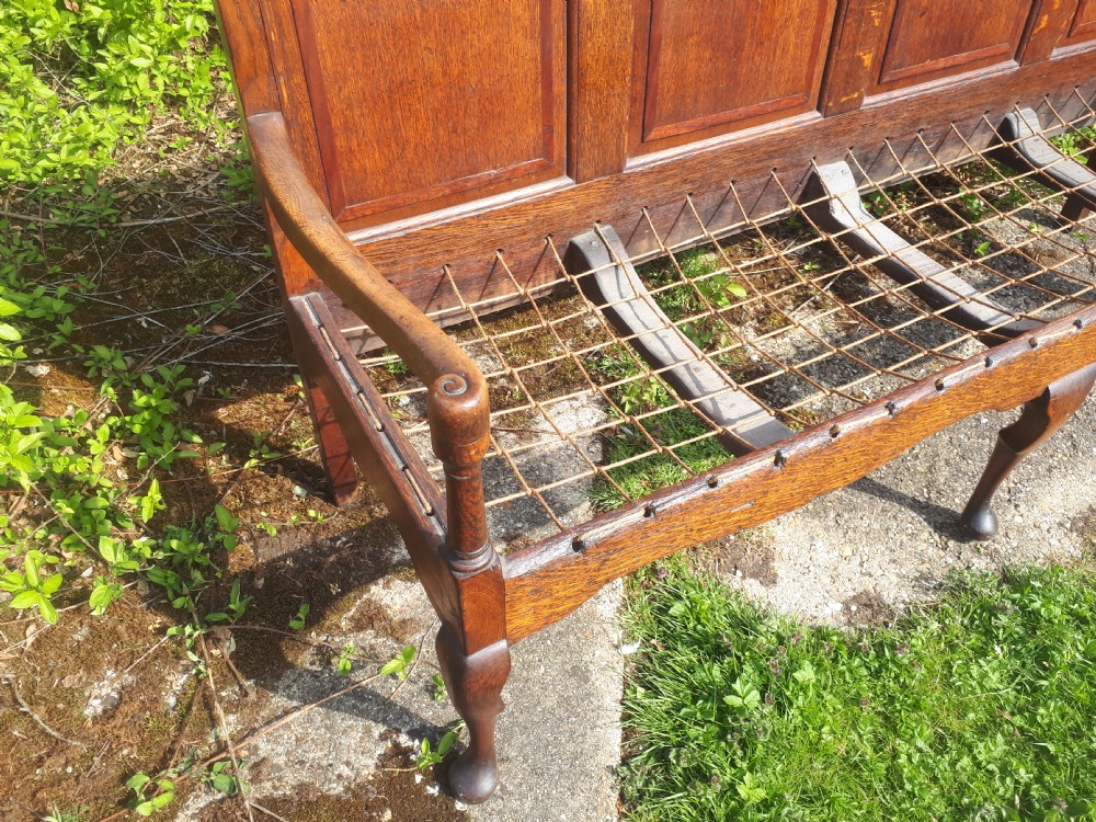 Late Georgian panelled back oak hall seat. View V