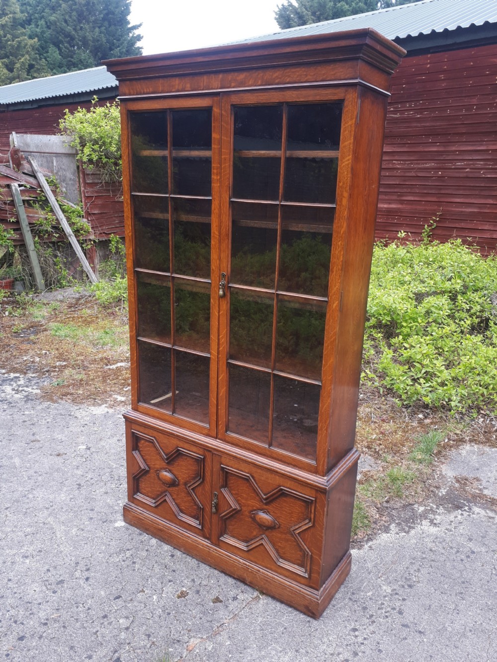 Waring & Gillow oak bookcase cabinet. View II