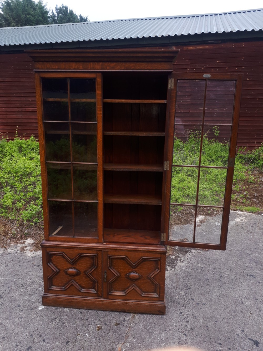 Waring & Gillow oak bookcase cabinet. View IV