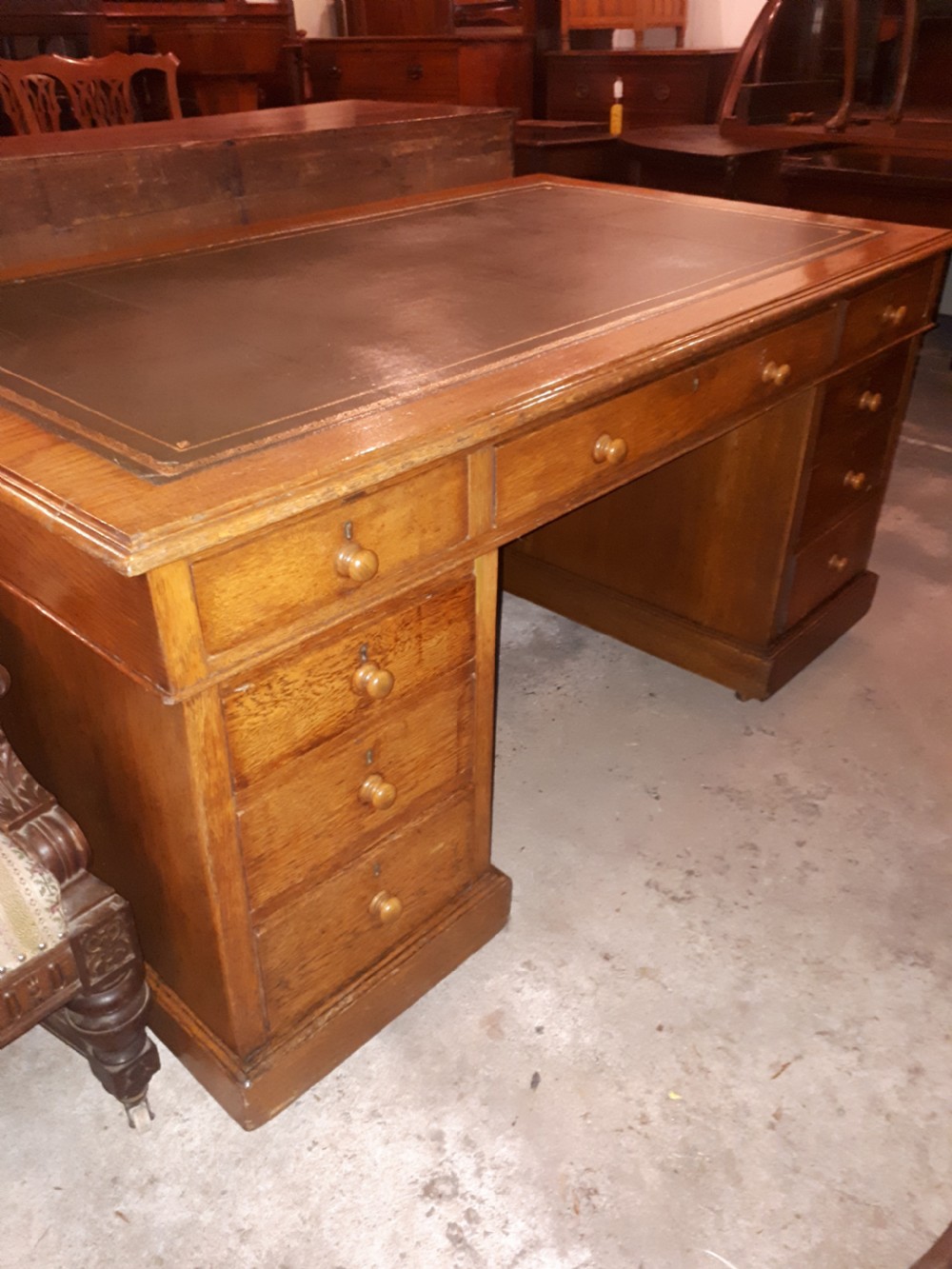 Large Late Victorian oak kneehole pedestal desk 