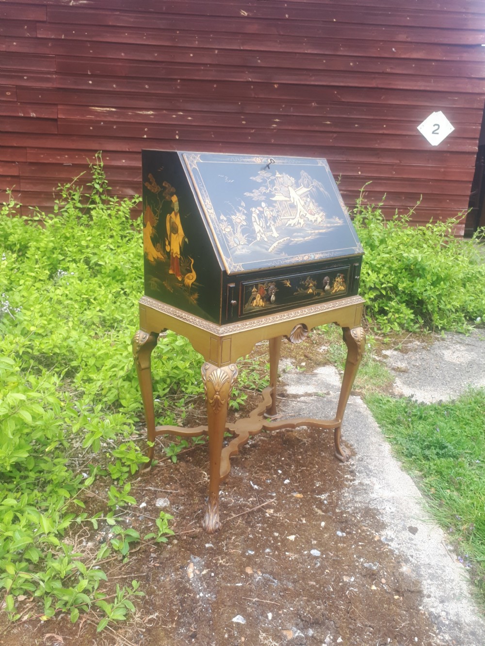 Early 20th century lacquered bureau on gilt stand