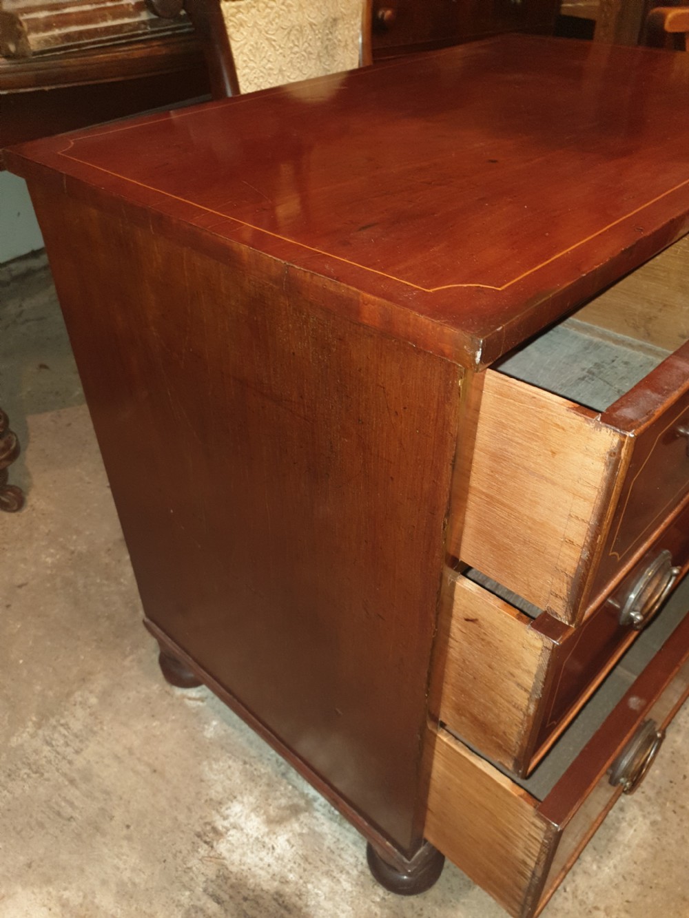Pretty small Regency chest of drawers View III