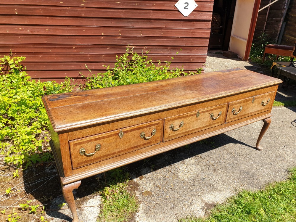 Early 19th century oak 3 drawer dresser base. View II