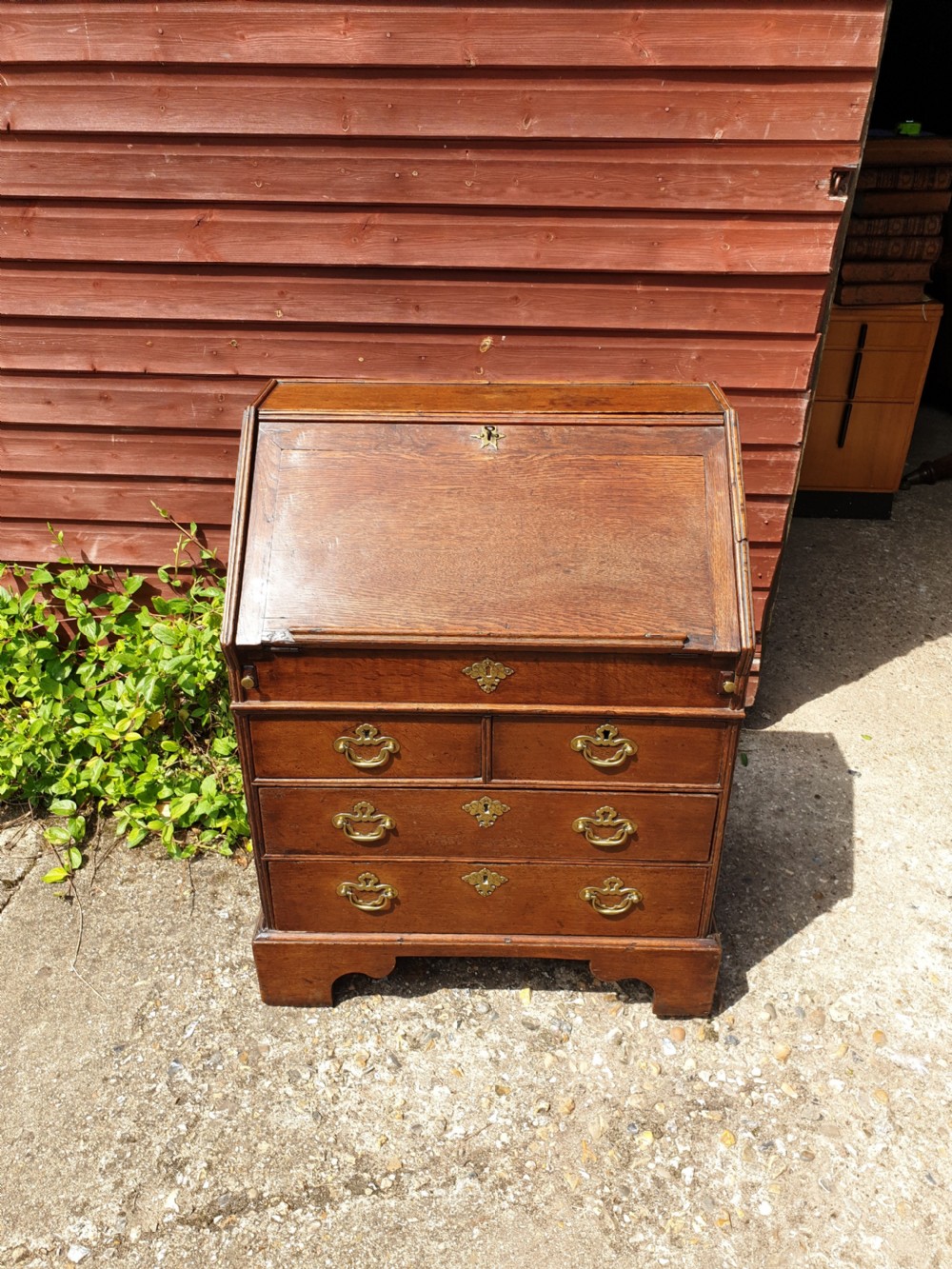 Small antique 30 inch oak writing bureau.