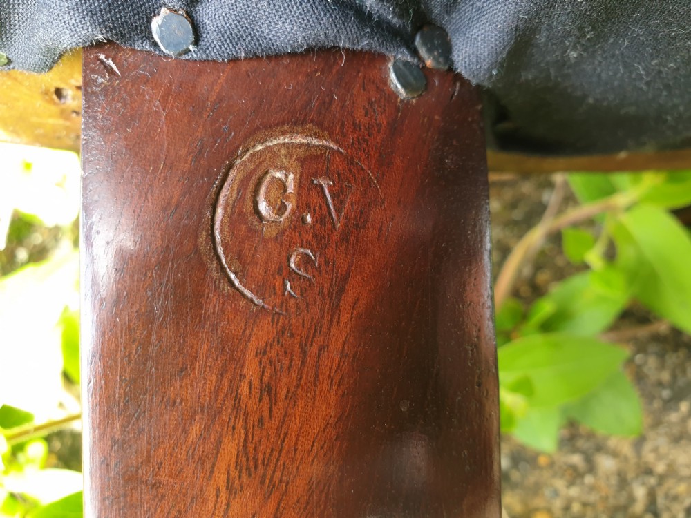 Late Victorian mahogany desk armchair with makers stamp.  View III