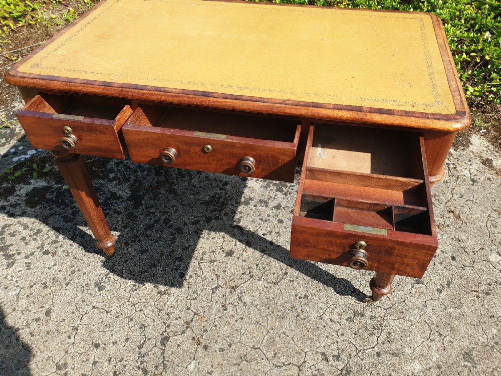 Early Victorian mahogany 3 drawer writing table View II