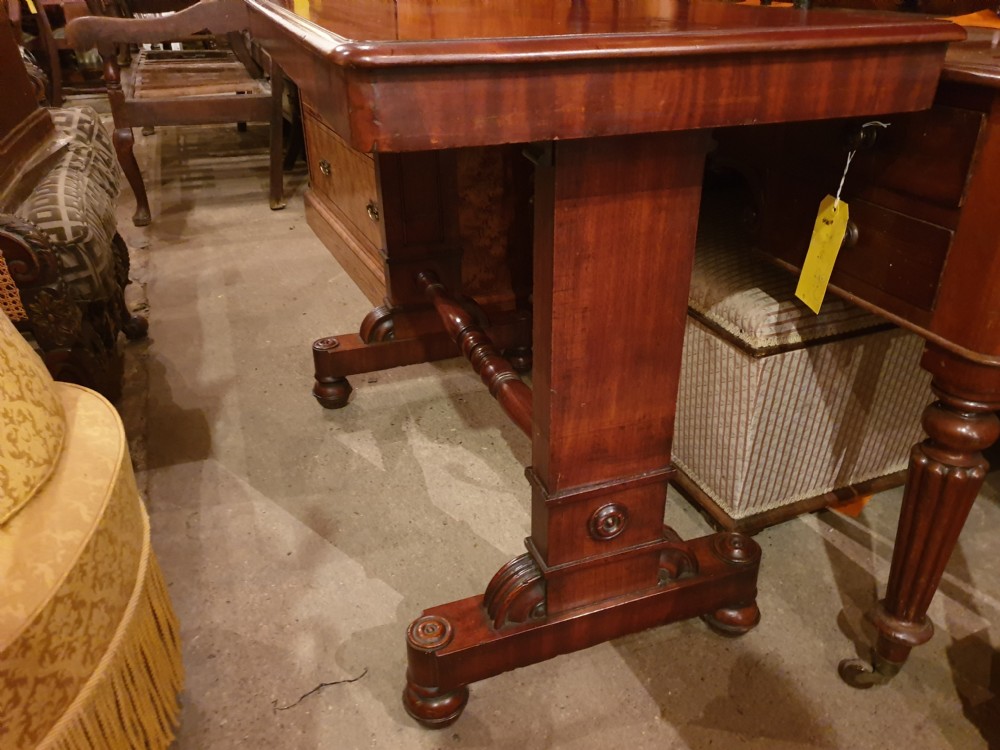 An early Victorian three-tier mahogany adjustable buffet featuring rectangular polished wooden shelves resting on a sturdy pedestal base. View II