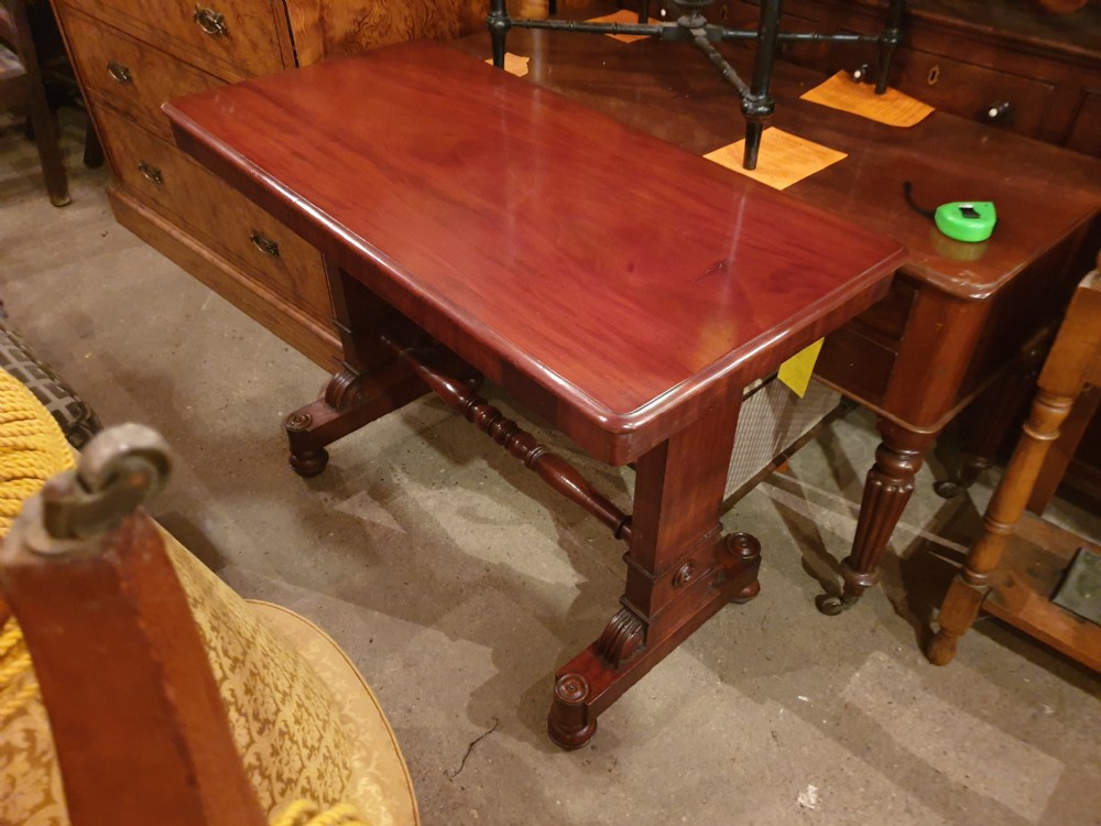 An early Victorian three-tier mahogany adjustable buffet featuring rectangular polished wooden shelves resting on a sturdy pedestal base. View V
