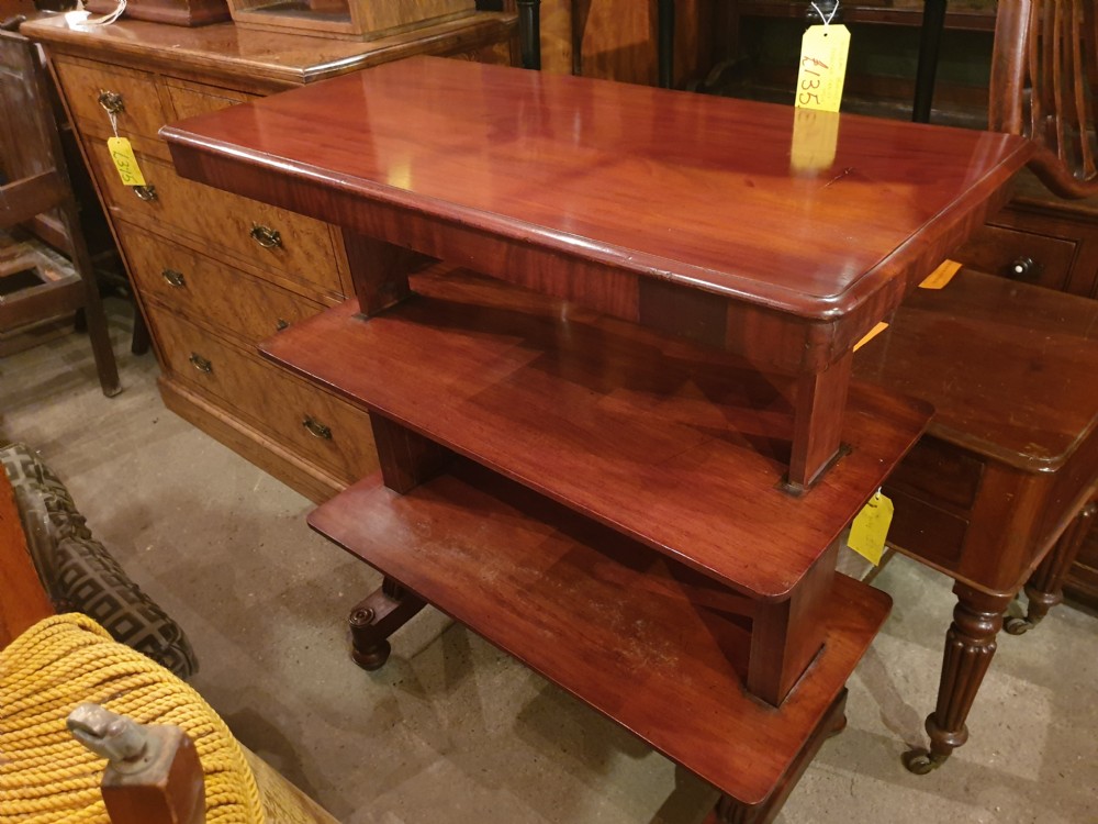 An early Victorian three-tier mahogany adjustable buffet featuring rectangular polished wooden shelves resting on a sturdy pedestal base. View VIII