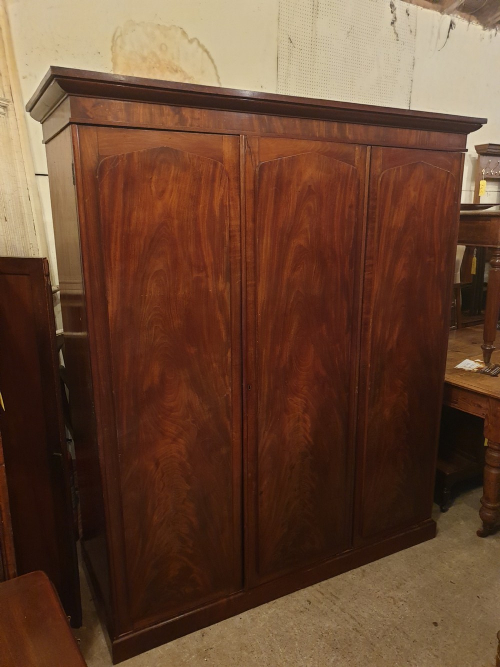Neat and practical Early Victorian 3 door fitted wardrobe 