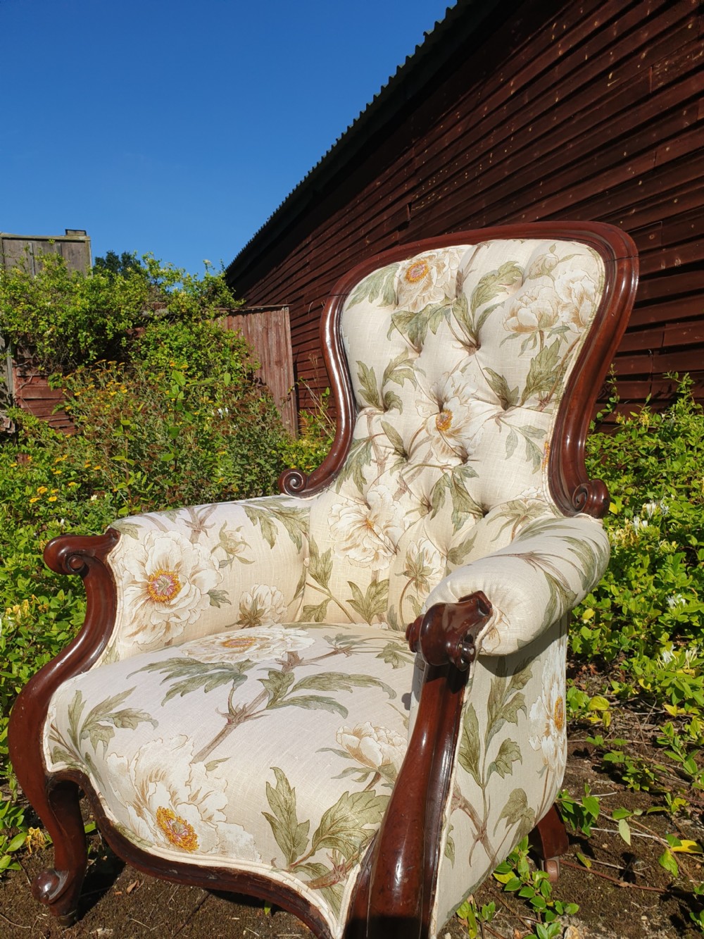 Victorian upholstered mahogany framed spoon back armchair 