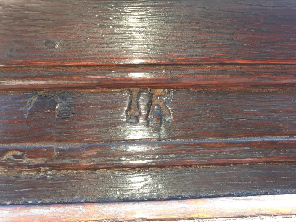 Neat and useful antique carved oak hall cupboard . View III
