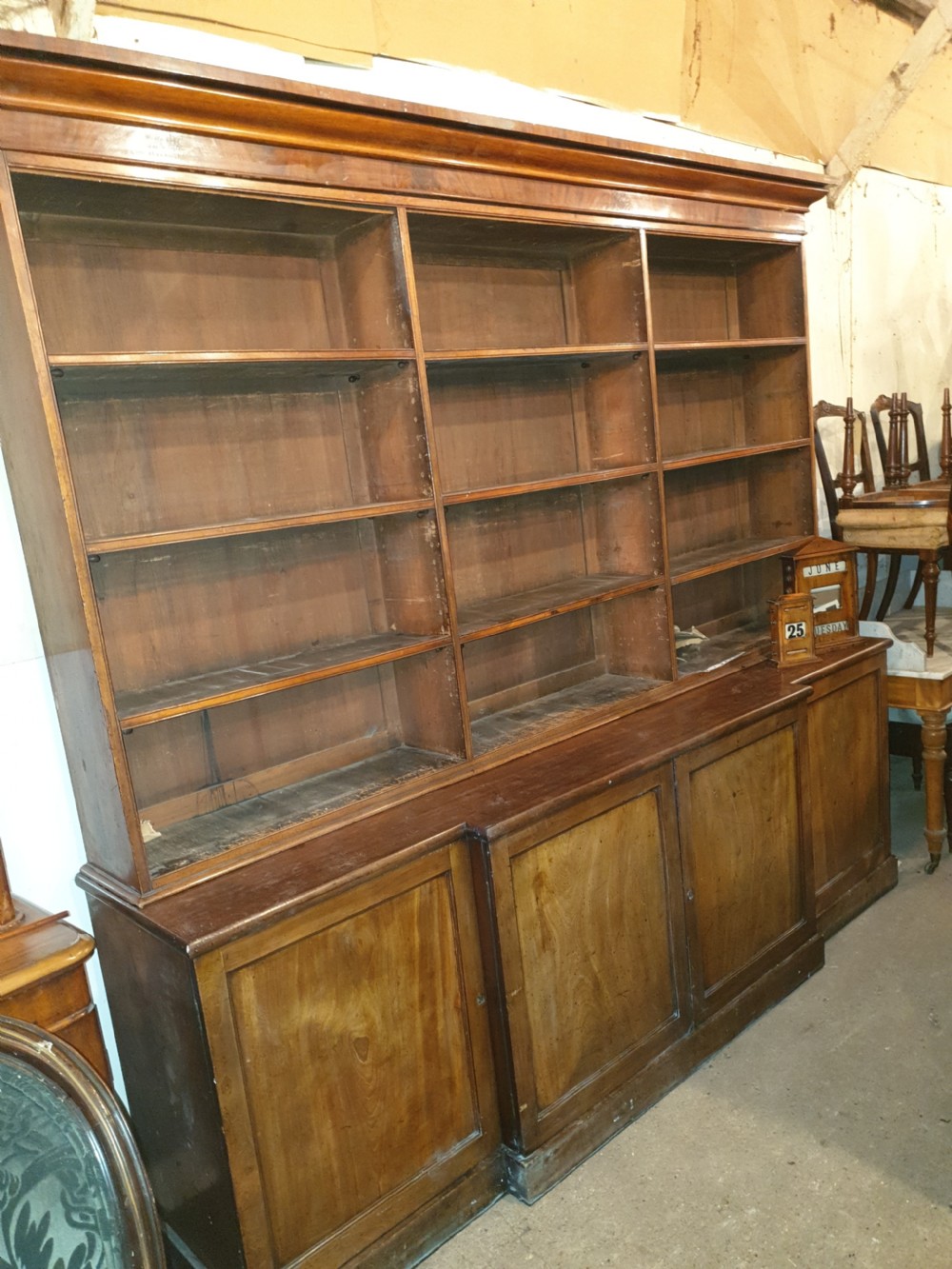 Good early Victorian mahogany open front breakfront bookcase 