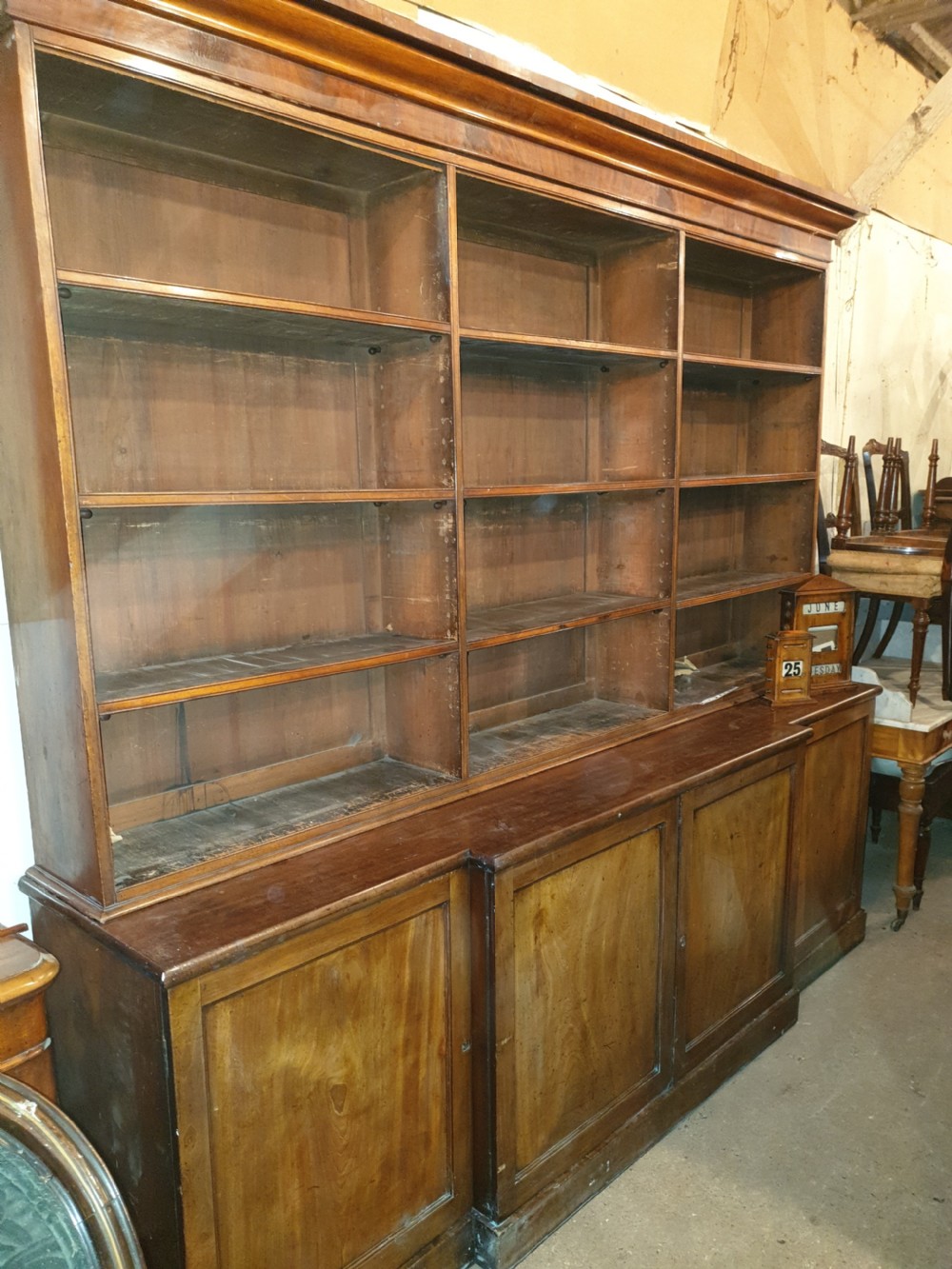 Good early Victorian mahogany open front breakfront bookcase  View II