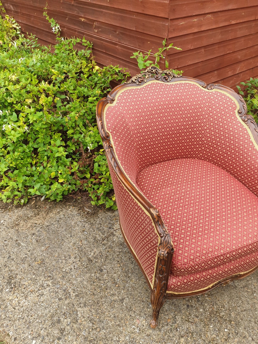 Good deep comfortable upholstered armchair.  View IV