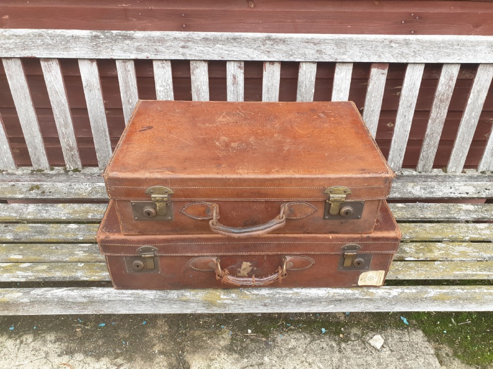 2 leather suitcases 