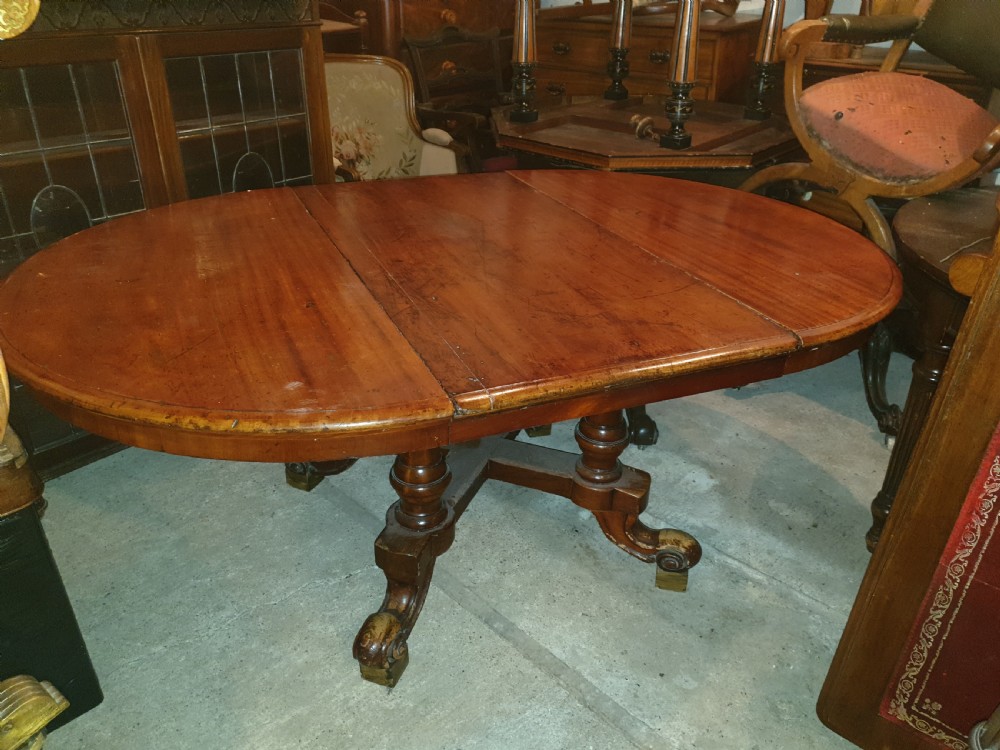 Early Victorian extending dining table.