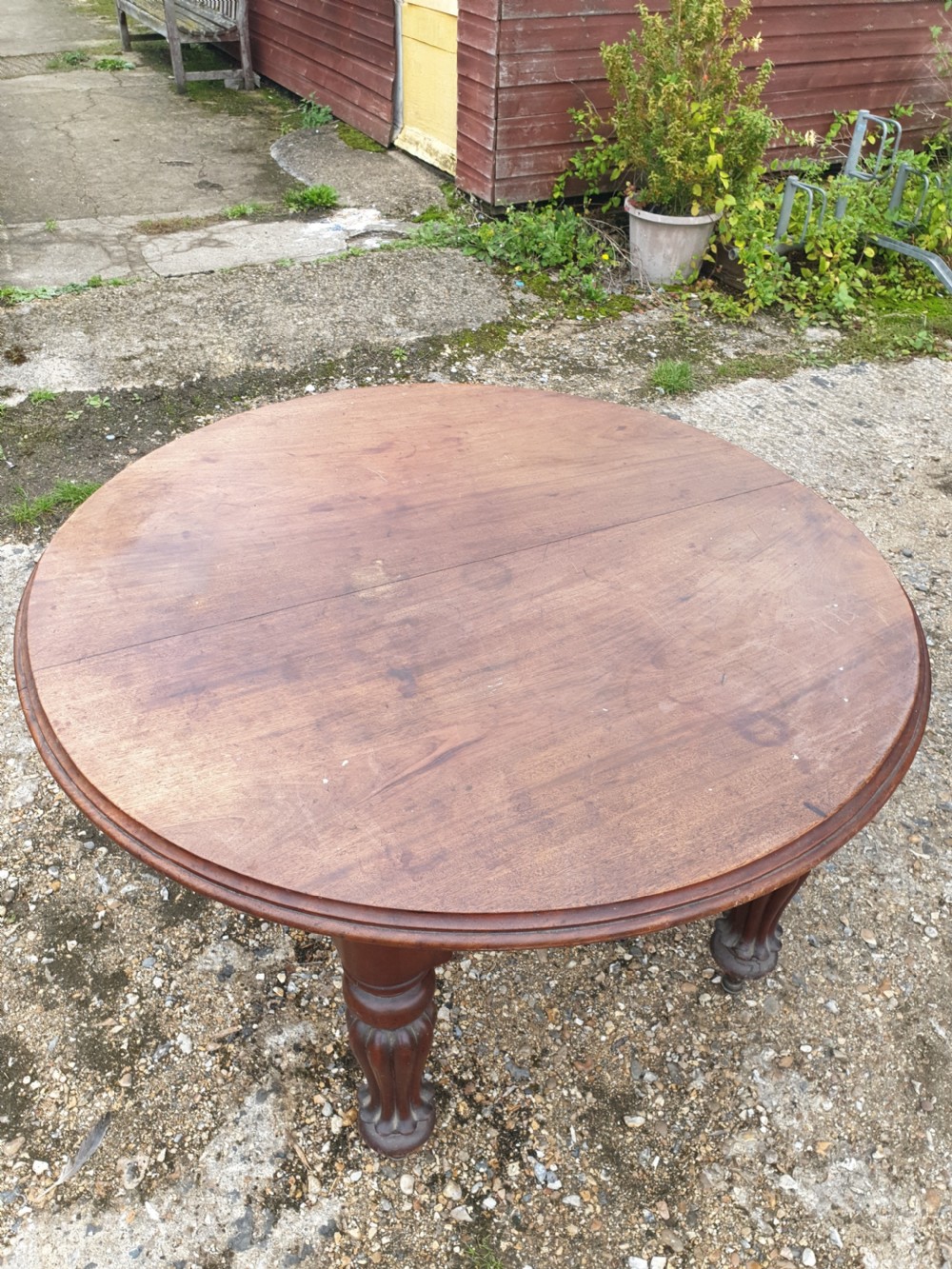 Mid 19th century round extending mahogany 8 foot dining table  View II