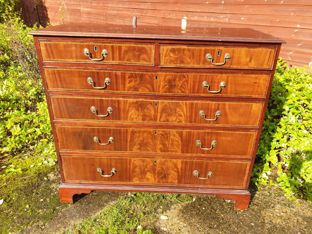 Early 19th century inlaid mahogany chest of drawers  View II