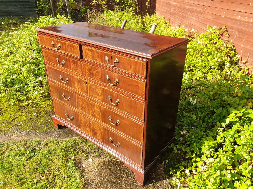 Early 19th century inlaid mahogany chest of drawers  View VI
