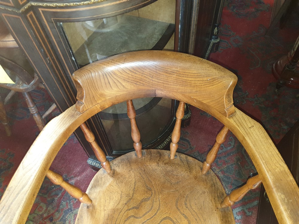 Early 20th century smokers bow desk armchair.  View II