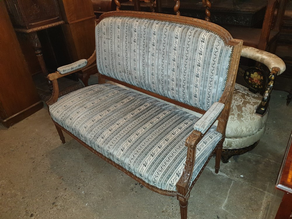 Walnut frame 2 seater sofa. View IV