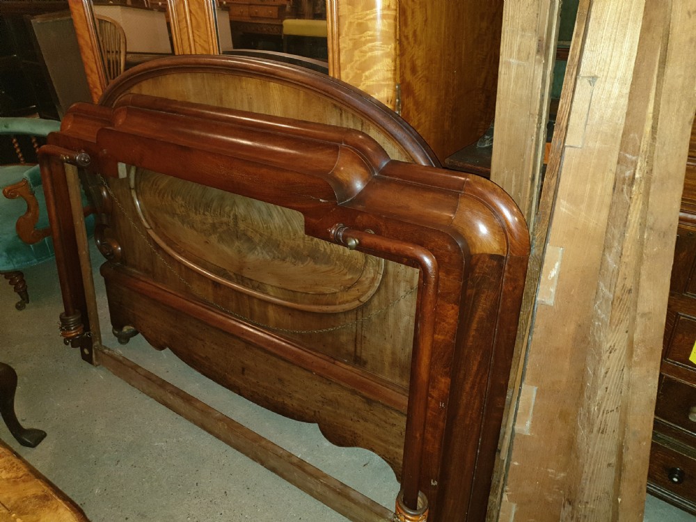 Complete Mid 19th century mahogany half tester bed frame.