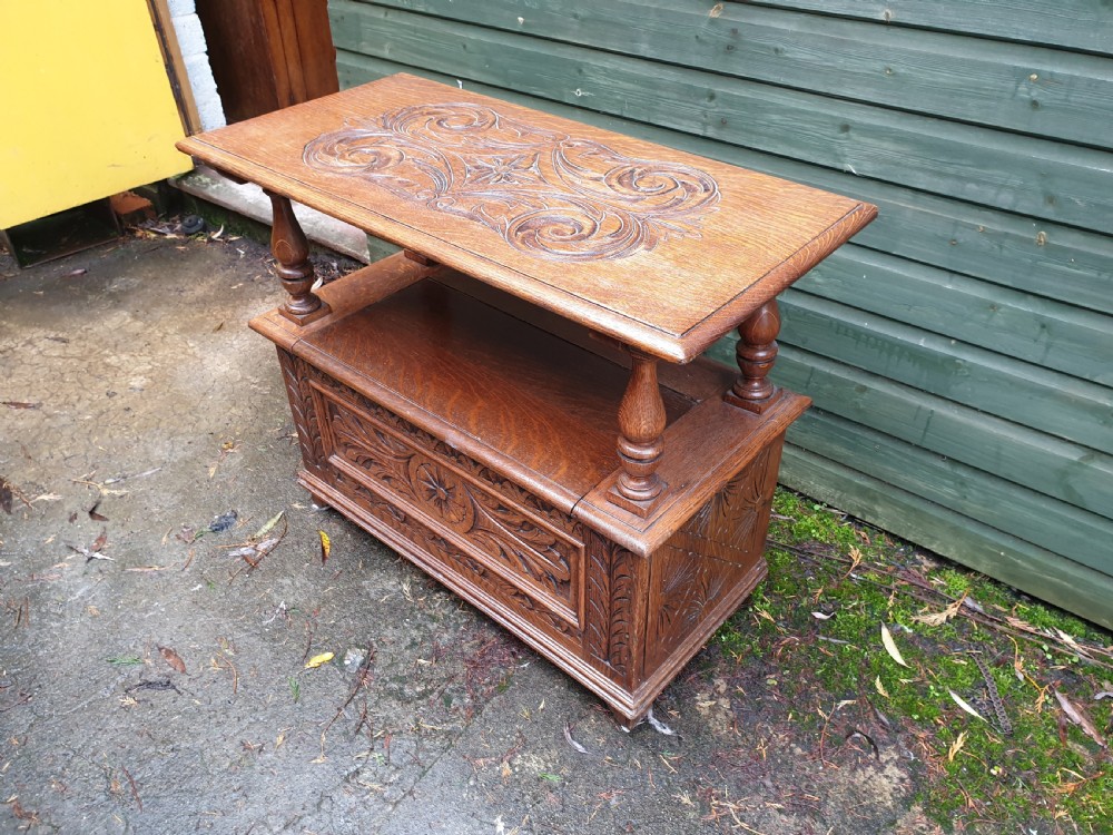 Carved oak fold over top monks hall seat View IV