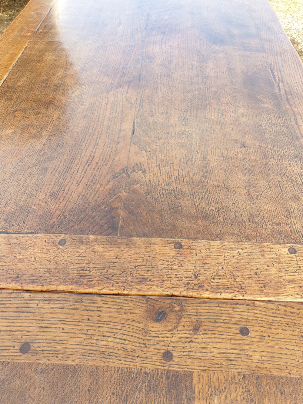 Large carved oak draw leaf refectory dining table.  View IV