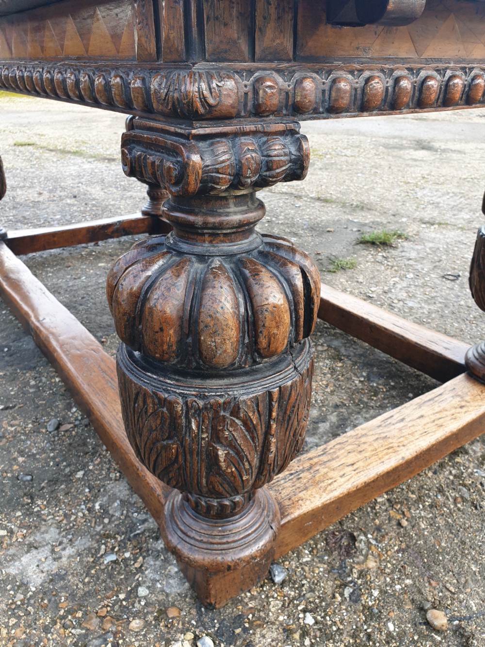 Large carved oak draw leaf refectory dining table.  View XII