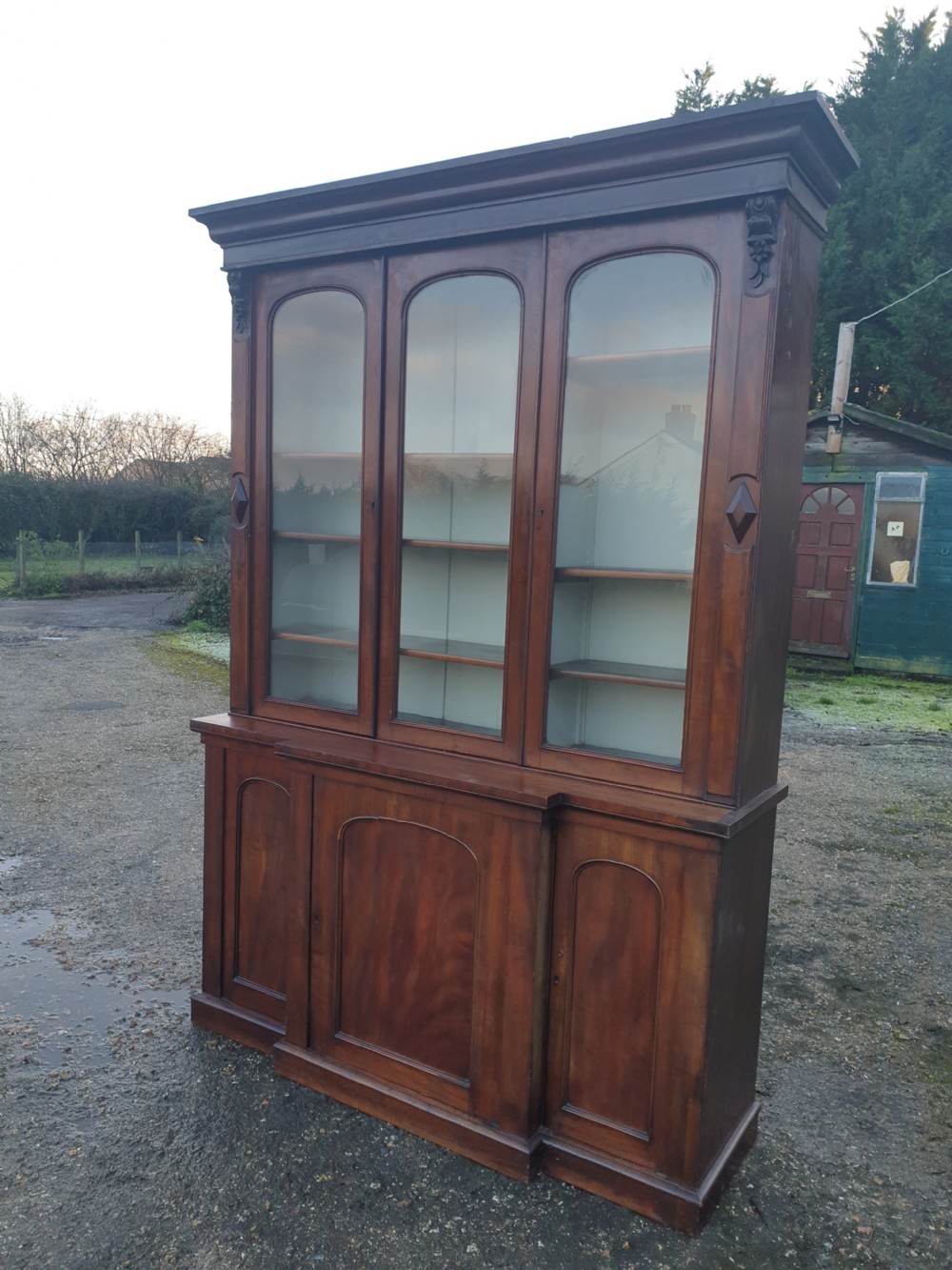 Good compact Victorian mahogany breakfront bookcase  View II