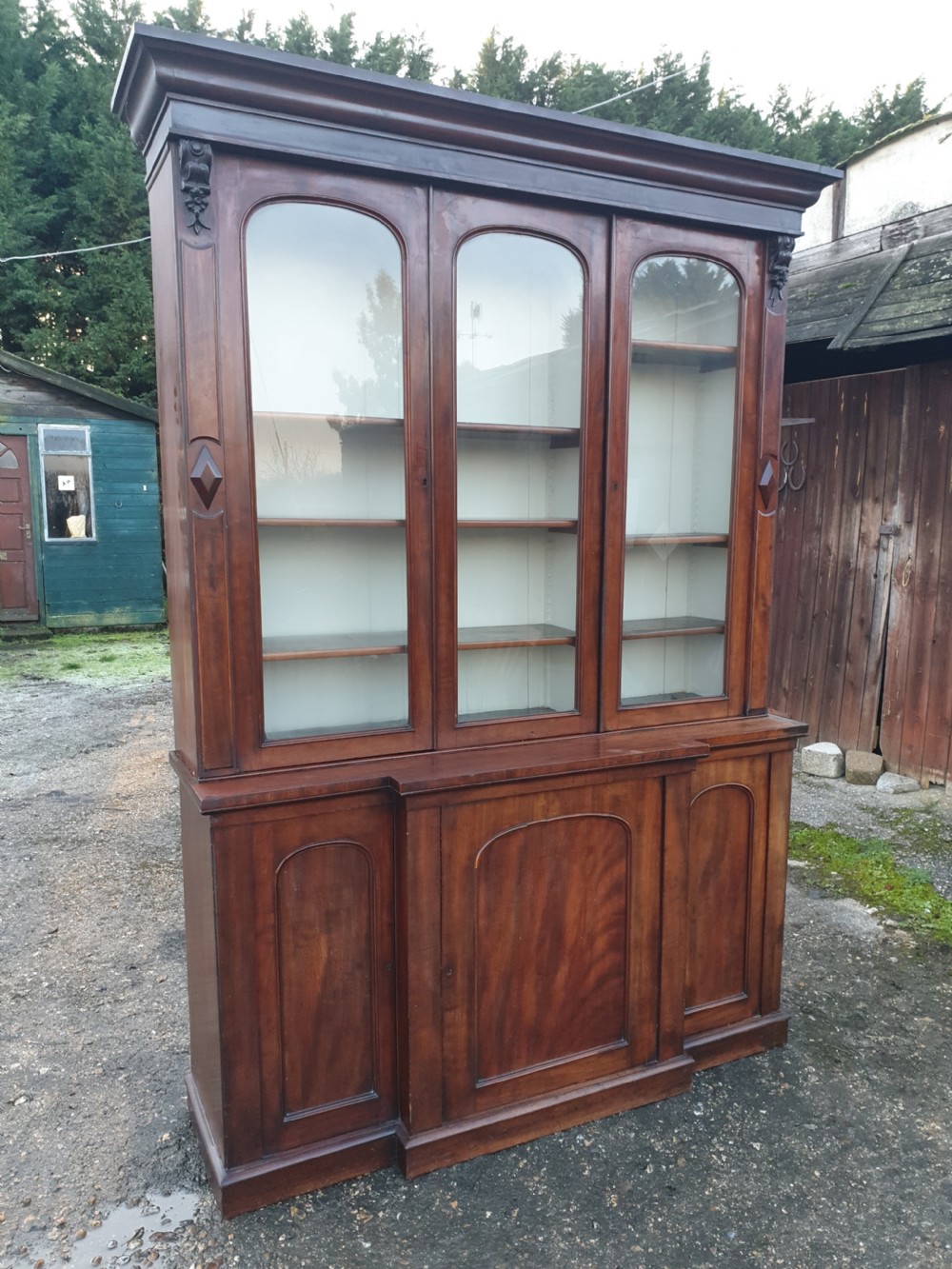 Good compact Victorian mahogany breakfront bookcase  View III