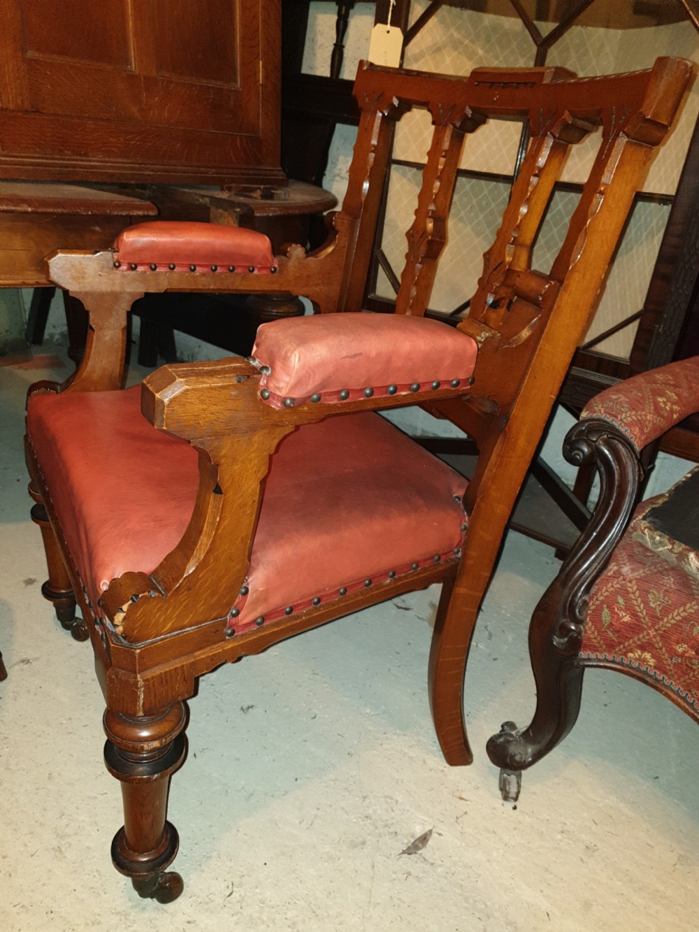 Good and solid Victorian oak desk armchair.  View IV