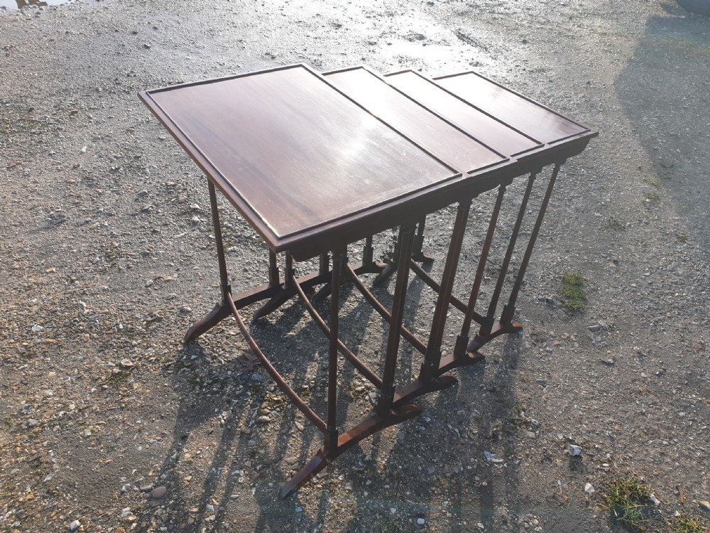 Nest of 4 Edwardian mahogany occasional tables.  View III