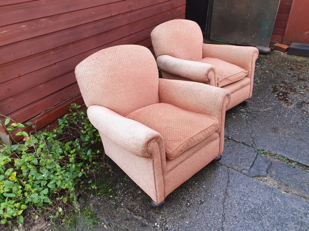Pair of upholstered early 20th century easy chairs 