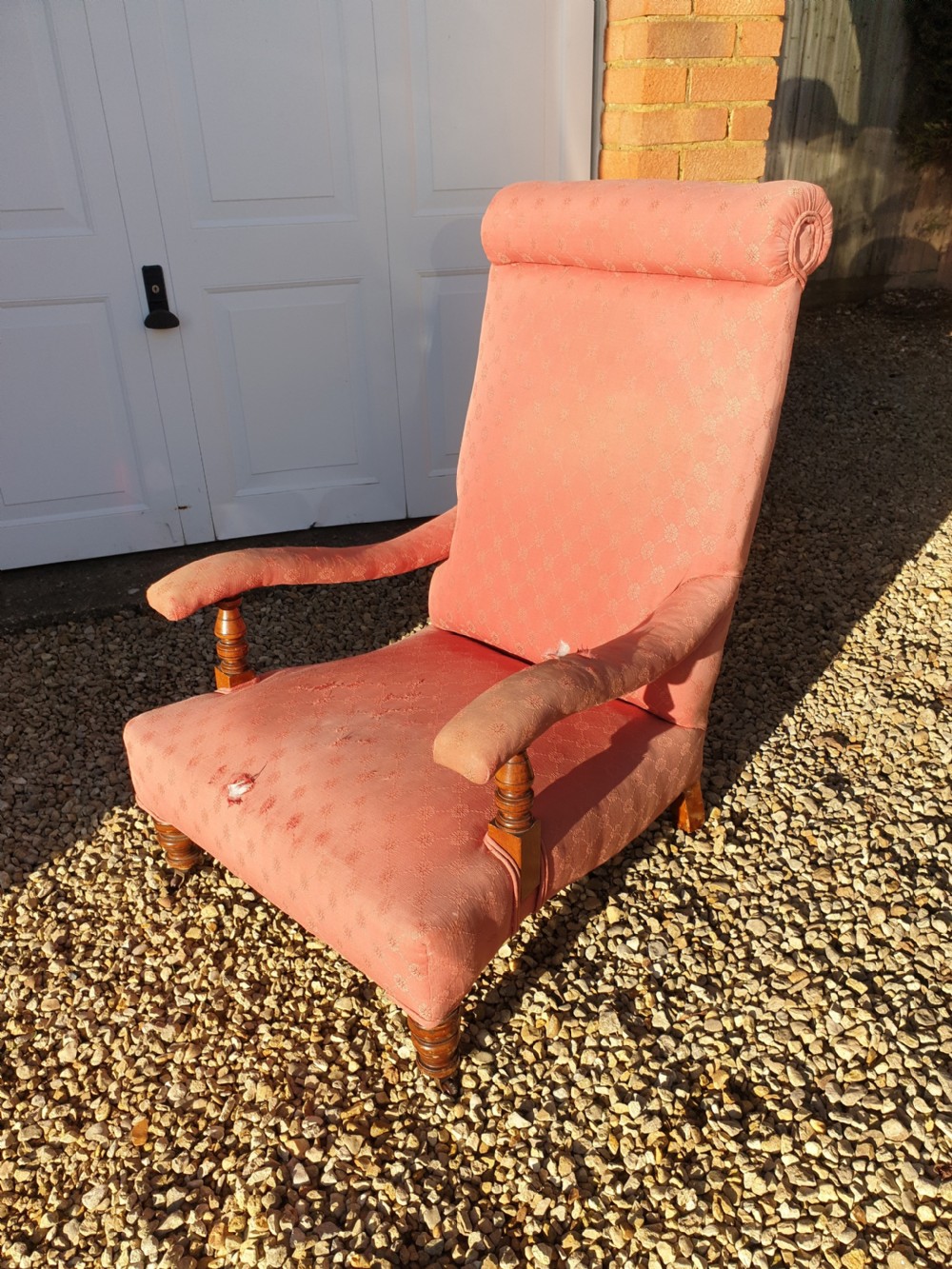 Late Victorian upholstered high back open arm armchair 
