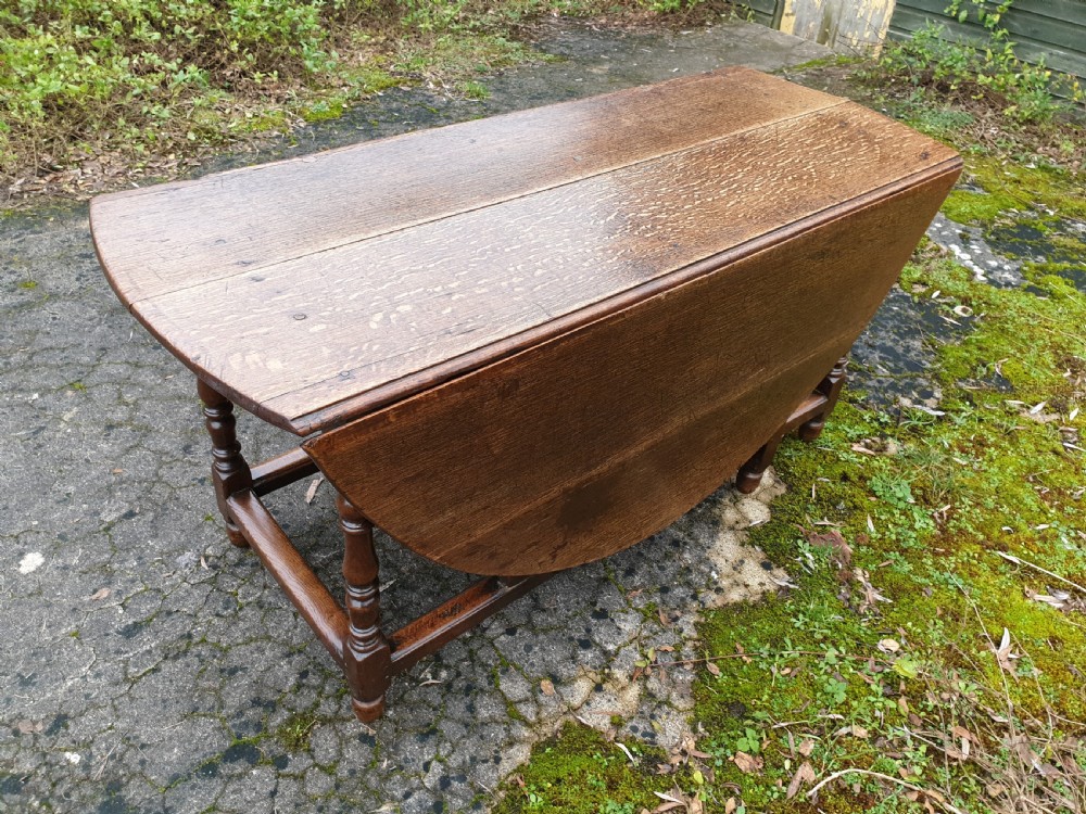 Large 8 seater late Georgian gate leg dining table  View IV