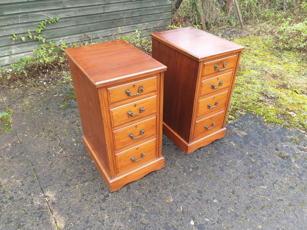 Pair of walnut bedside chests  View II