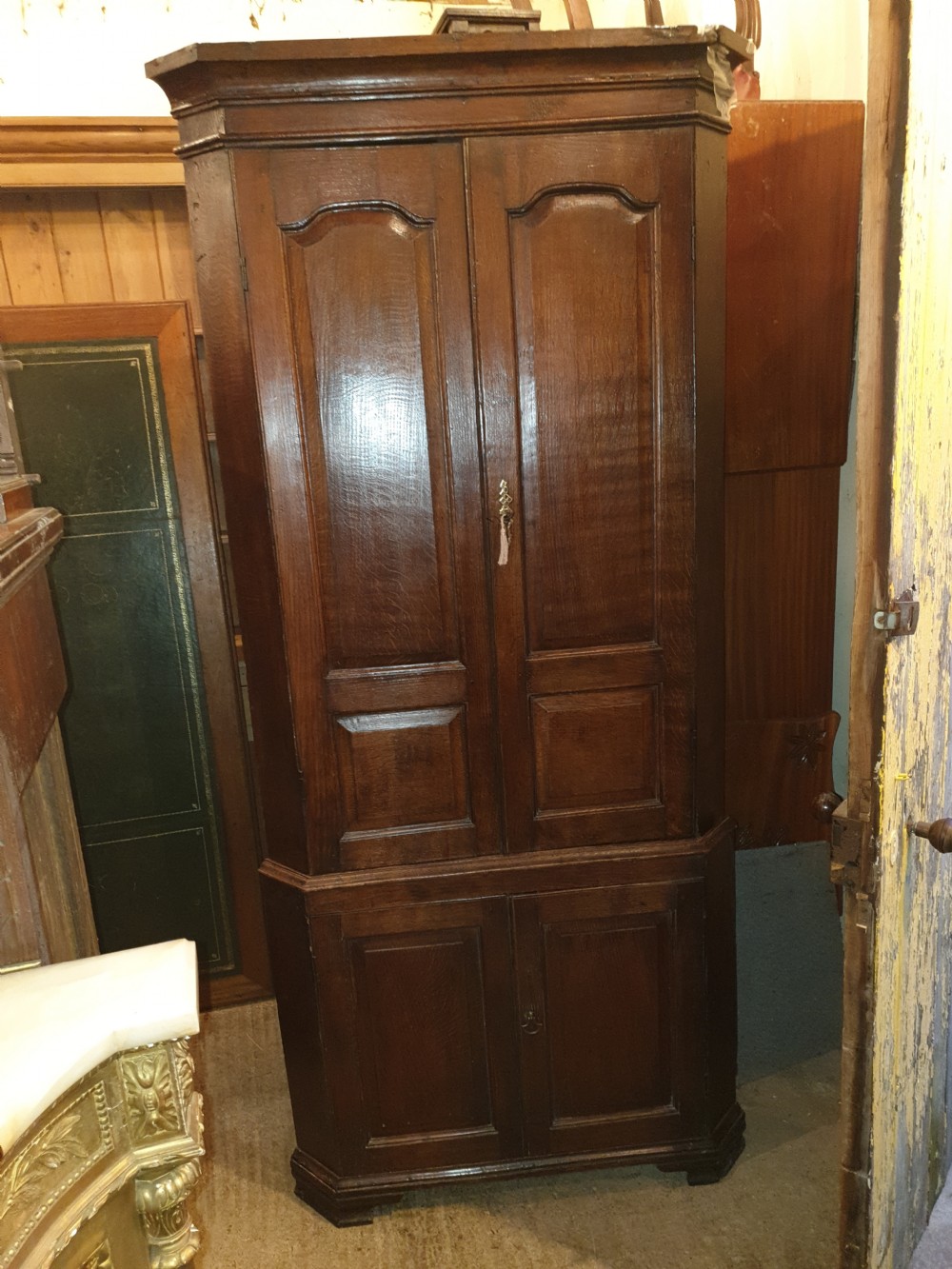 Late Georgian oak corner cupboard  View II