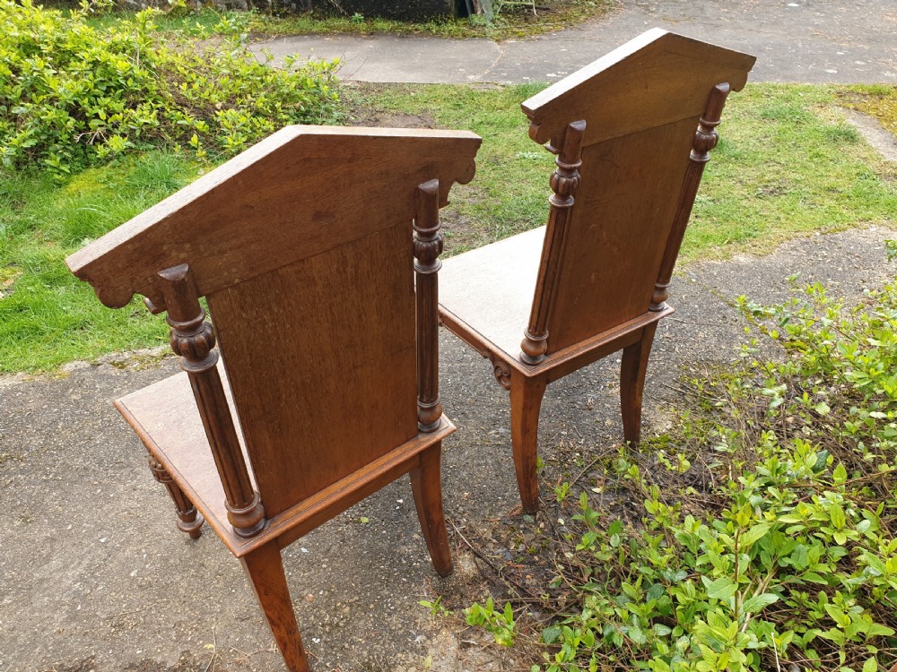 Pair Victorian oak hall chairs View III
