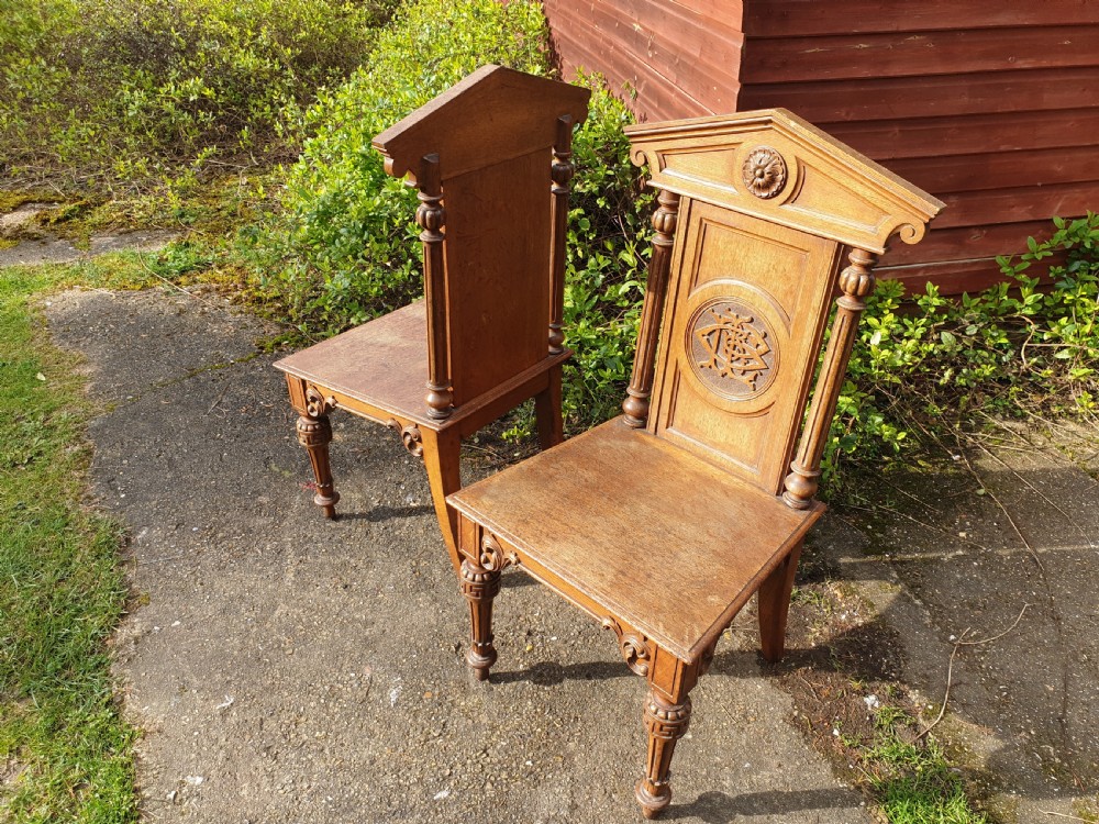 Pair Victorian oak hall chairs View V
