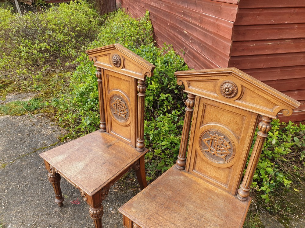 Pair Victorian oak hall chairs View VI