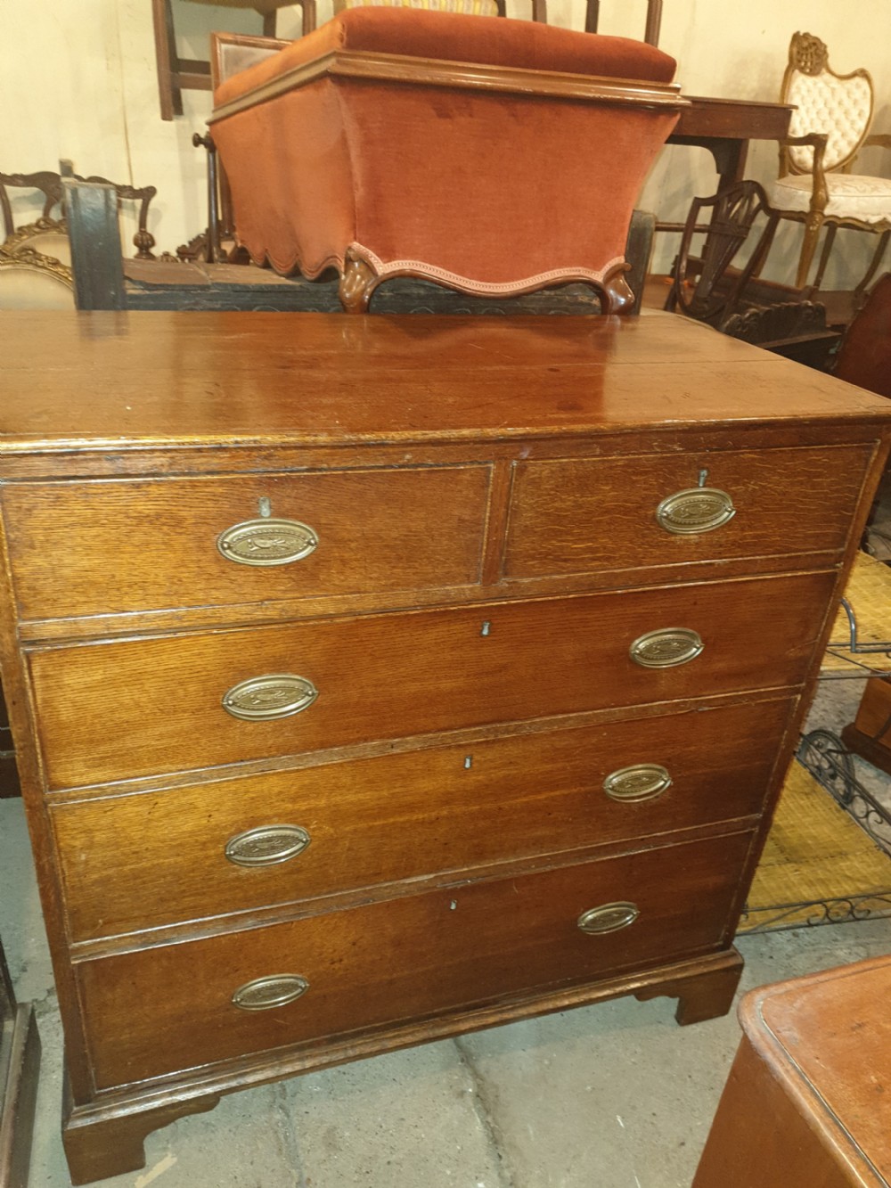 Good solid Georgian oak chest of drawers. View III